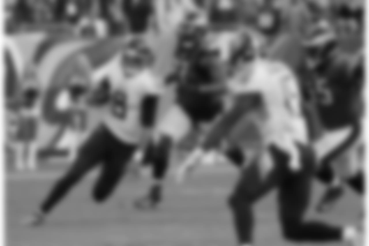 Tennessee Titans quarterback Marcus Mariota (8) scrambles against the Philadelphia Eagles in overtime of an NFL football game Sunday, Sept. 30, 2018, in Nashville, Tenn. (AP Photo/James Kenney)