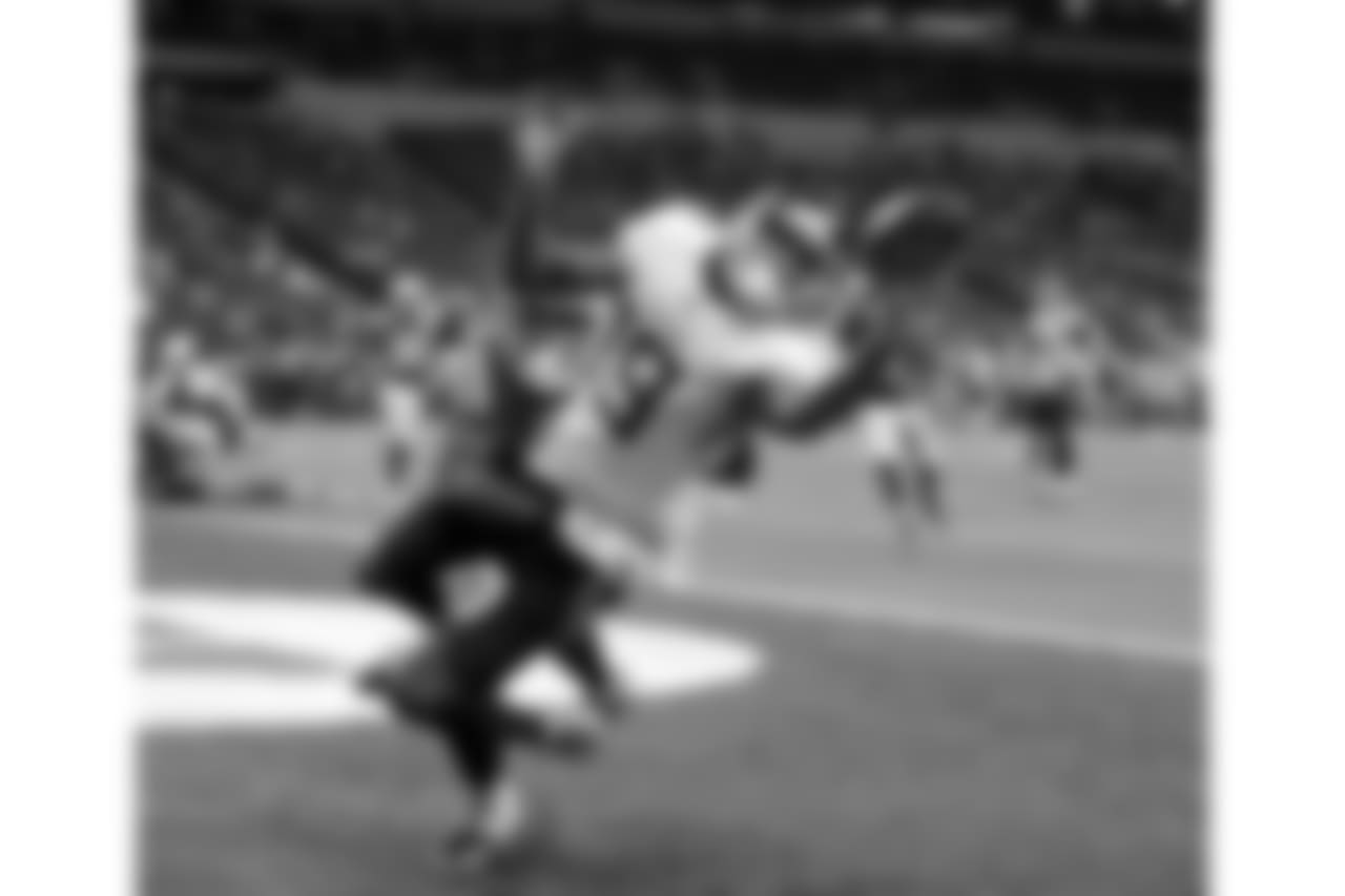 Tennessee Titans' Tajae Sharpe (19) makes a touchdown catch against Indianapolis Colts' Kenny Moore during the second half of an NFL football game Sunday, Nov. 18, 2018, in Indianapolis. (AP Photo/Michael Conroy)