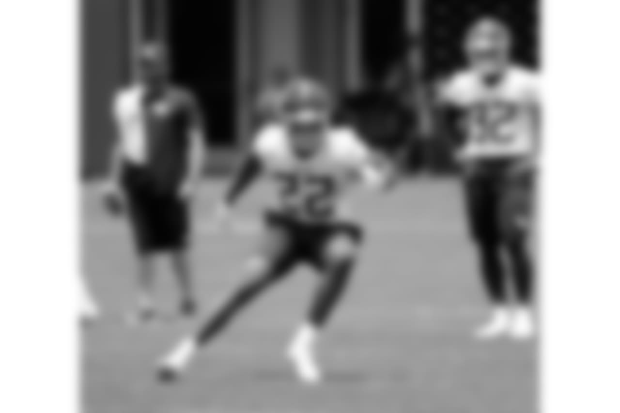 Tennessee Titans running back Derrick Henry (22) runs a drill during NFL football minicamp Tuesday, June 12, 2018, in Nashville, Tenn. (AP Photo/Mark Humphrey)