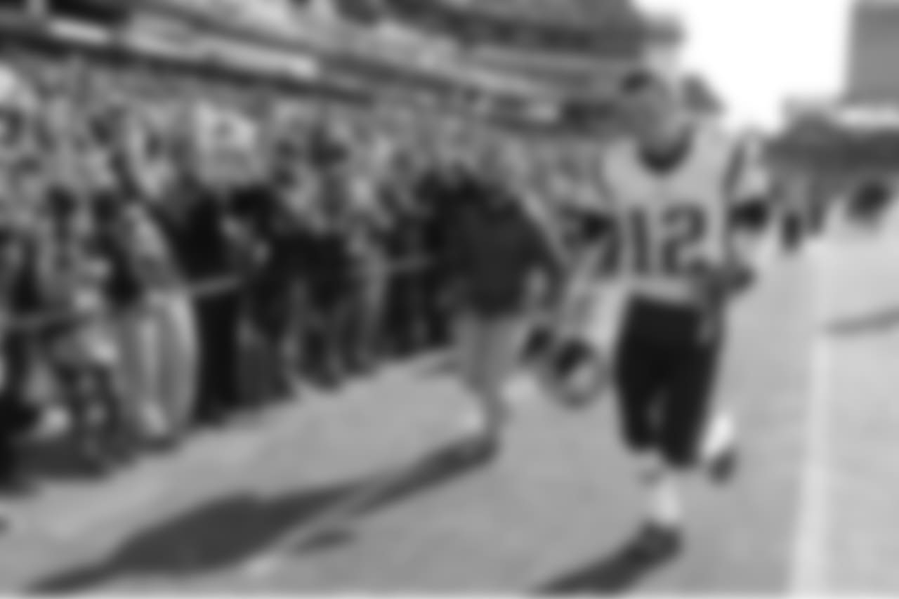 New England Patriots quarterback Tom Brady (12) leaves the field after warming up before an NFL football game against the Tennessee Titans Sunday, Nov. 11, 2018, in Nashville, Tenn. (AP Photo/Mark Zaleski)