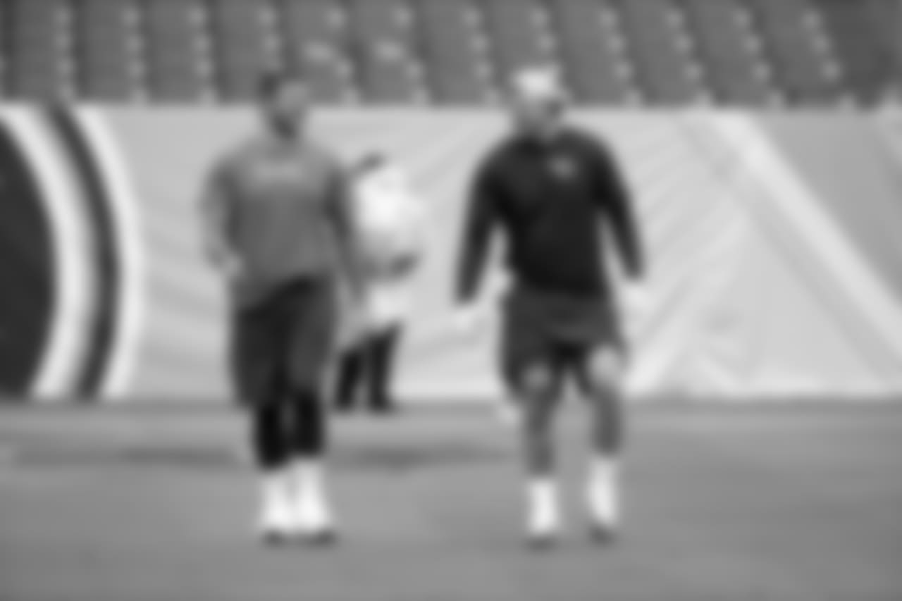 Tennessee Titans offensive tackle Jack Conklin, left, and offensive tackle Taylor Lewan warms up before an NFL football game against the Baltimore Ravens Sunday, Oct. 14, 2018, in Nashville, Tenn. (AP Photo/James Kenney)