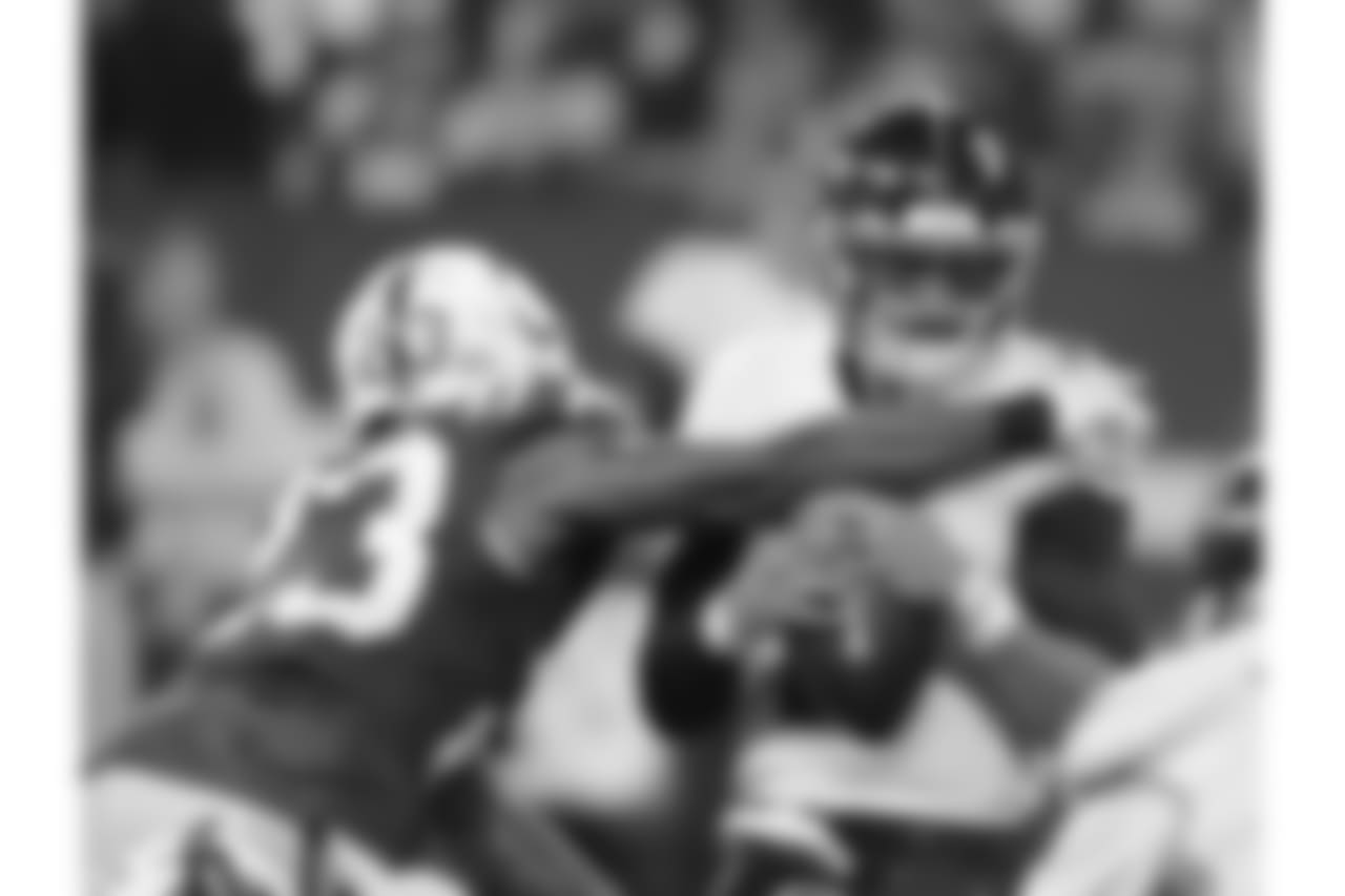Tennessee Titans quarterback Marcus Mariota is sacked by Indianapolis Colts' Kenny Moore (23) during the first half of an NFL football game, Sunday, Nov. 18, 2018, in Indianapolis. (AP Photo/Darron Cummings)