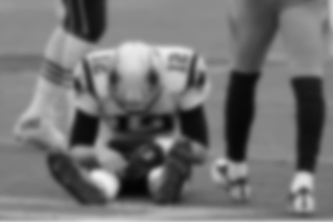 New England Patriots quarterback Tom Brady (12) sits on the turf after being sacked by the Tennessee Titans in the second half of an NFL football game Sunday, Nov. 11, 2018, in Nashville, Tenn. (AP Photo/Mark Zaleski)