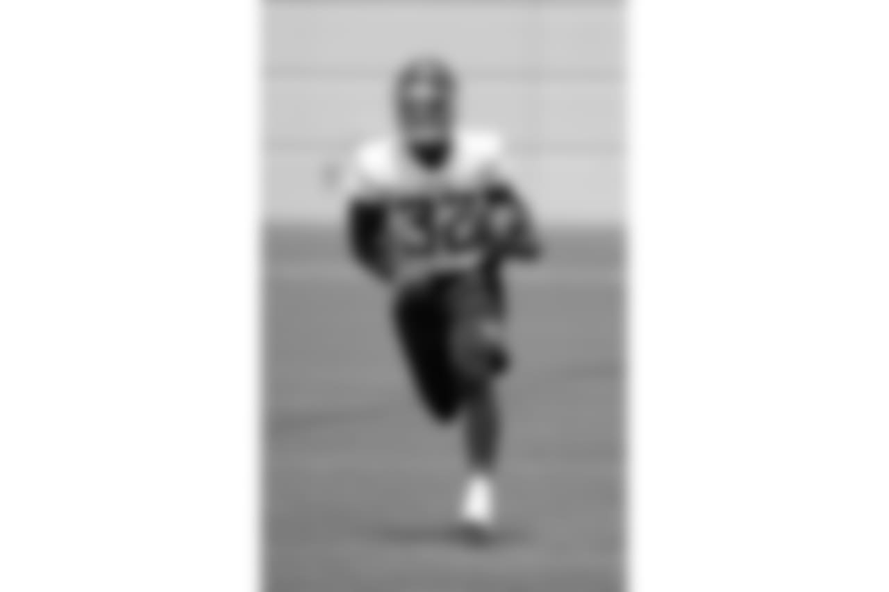Tennessee Titans running back David Fluellen runs a drill during NFL football minicamp Tuesday, June 12, 2018, in Nashville, Tenn. (AP Photo/Mark Humphrey)