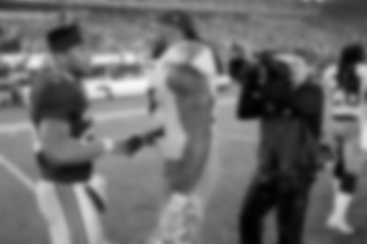 New York Giants running back Saquon Barkley, left, talks to Tennessee Titans running back Derrick Henry after an NFL football game, Sunday, Dec. 16, 2018, in East Rutherford, N.J. The Titans won 17-0. (AP Photo/Seth Wenig)
