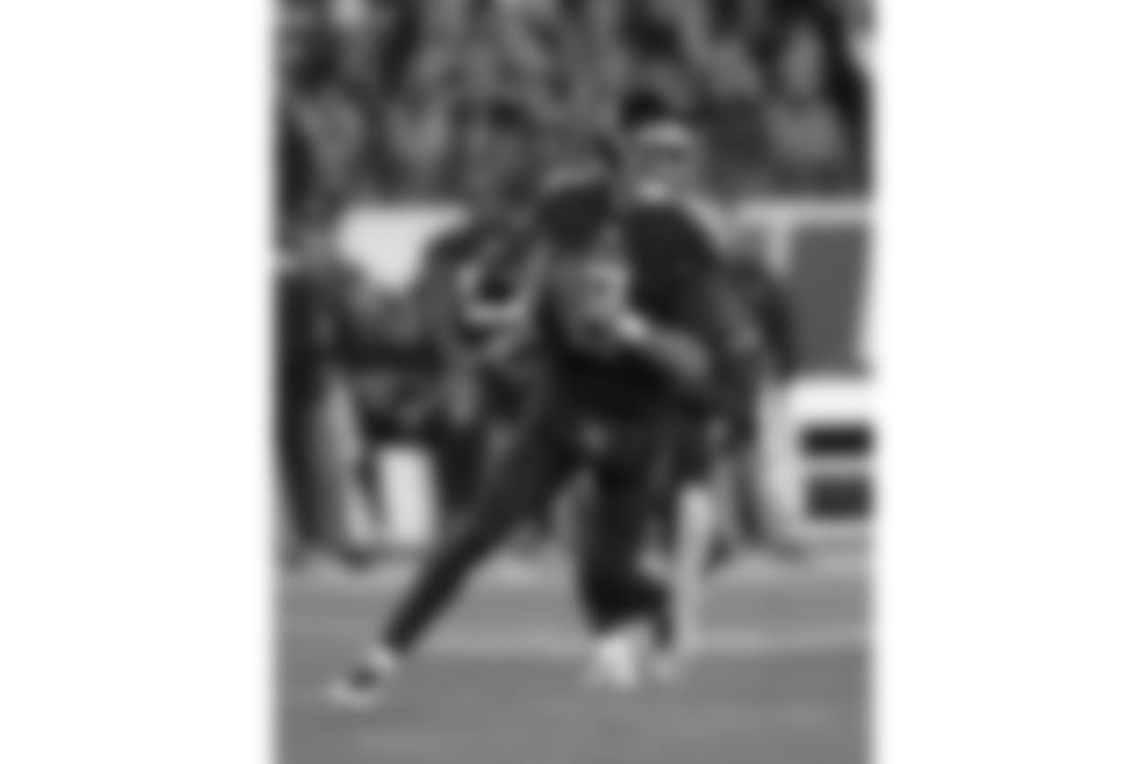 Tennessee Titans quarterback Marcus Mariota (8) works against the Jacksonville Jaguars during the first half of an NFL football game, Thursday, Dec. 6, 2018, in Nashville, Tenn. (AP Photo/Mark Zaleski)