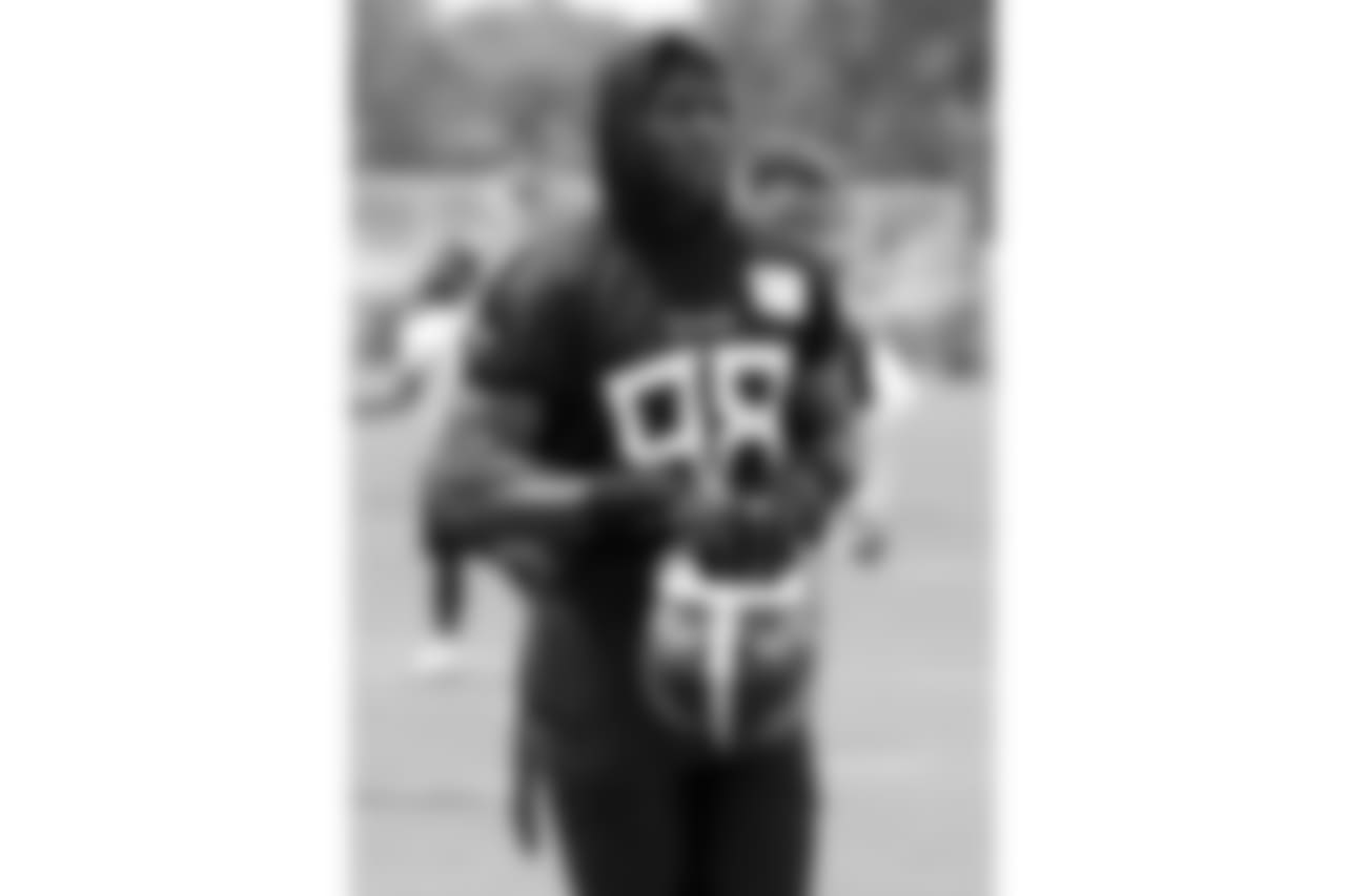 Tennessee Titans linebacker Brian Orakpo leaves the field after NFL football training camp Thursday, July 26, 2018, in Nashville, Tenn. (AP Photo/Mark Humphrey)