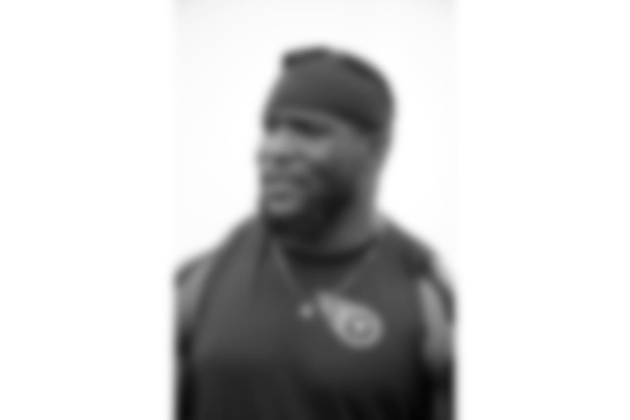 Tennessee Titans linebacker Brian Orakpo talks with friends after a practice at NFL football training camp Wednesday, Aug. 5, 2015, in Nashville, Tenn. (AP Photo/Mark Humphrey)