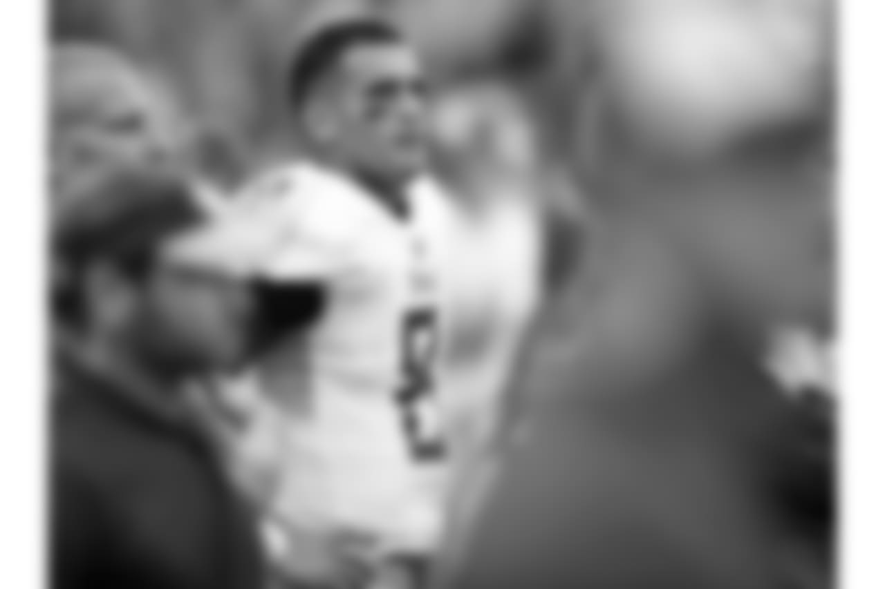 Tennessee Titans quarterback Marcus Mariota looks on from the bench during the second half of an NFL football game against the Buffalo Bills, Sunday, Oct. 7, 2018, in Orchard Park, N.Y. (AP Photo/Adrian Kraus)