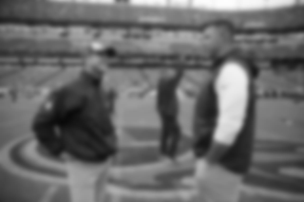 Baltimore Ravens head coach John Harbaugh, left, and Tennessee Titans head coach Mike Vrabel talk before an NFL football game Sunday, Oct. 14, 2018, in Nashville, Tenn. (AP Photo/James Kenney)