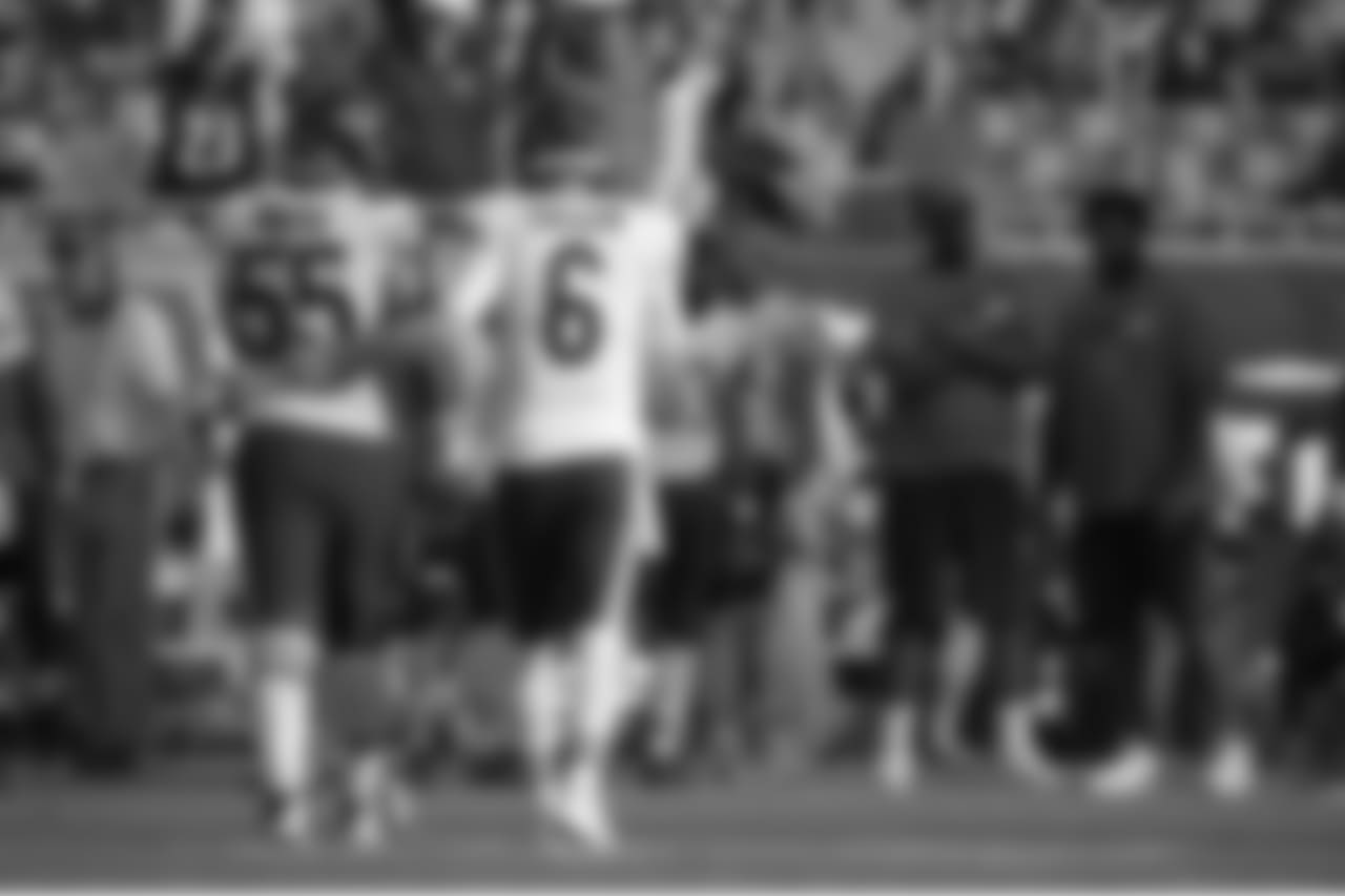 Chicago Bears quarterback Jay Cutler (6) and center Hroniss Grasu (55) walk off the field after a series during the second half of an NFL football game against the Tampa Bay Buccaneers in Tampa, Fla., Sunday, Dec. 27, 2015. The Bears won 26-21. (AP Photo/Phelan M. Ebenhack)