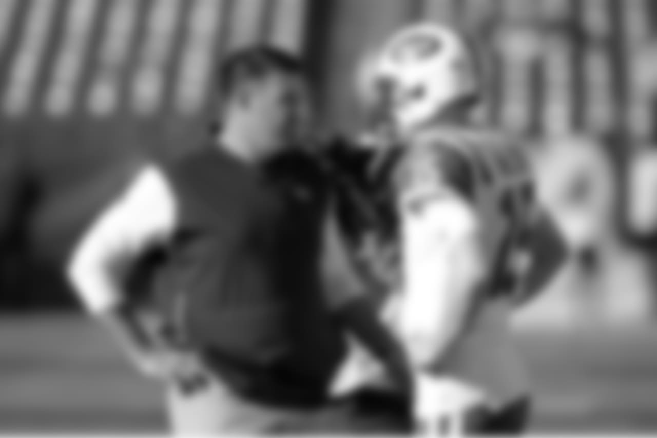 Tennessee Titans head coach Mike Vrabel talks with New York Jets quarterback Josh McCown (15) before an NFL football game Sunday, Dec. 2, 2018, in Nashville, Tenn. (AP Photo/Mark Zaleski)