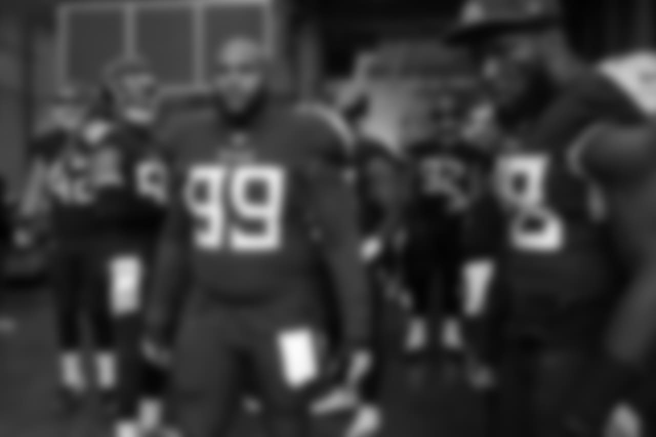 Tennessee Titans defensive tackle Jurrell Casey (99) and linebacker Brian Orakpo (98) wait to take the field before an NFL football game between the Titans and the Baltimore Ravens Sunday, Oct. 14, 2018, in Nashville, Tenn. (AP Photo/James Kenney)