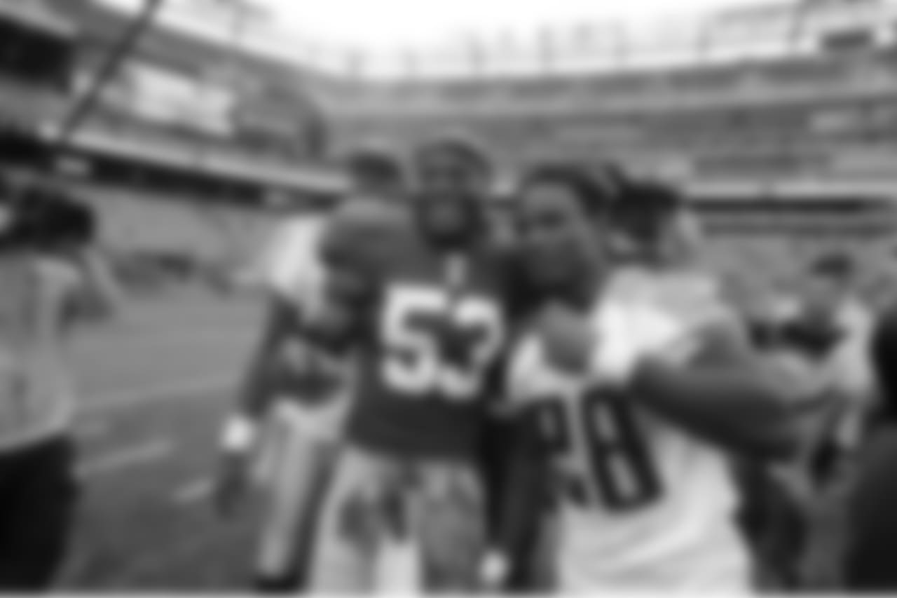 New York Giants linebacker Keith Bulluck (53) pose for a photo with formerTennessee Titan team mates Vince Young and Chris Johnson (28) after a week 3 NFL football game at the New Meadowlands Stadium in East Rutherford, New Jersey on Sunday September 26, 2010 (AP Photo/Evan Pinkus)