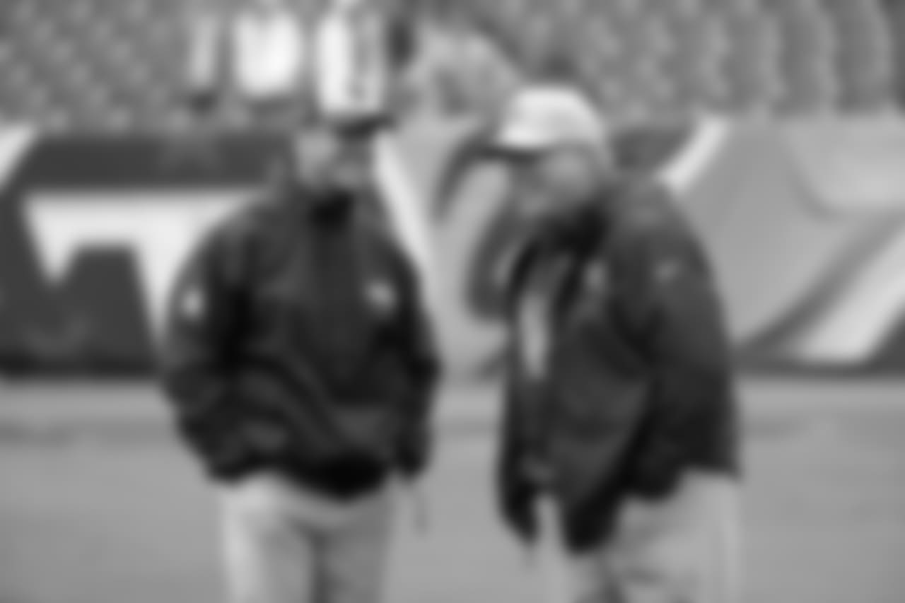 Baltimore Ravens head coach John Harbaugh, left, talks with Tennessee Titans defensive coordinator Dean Pees before an NFL football game Sunday, Oct. 14, 2018, in Nashville, Tenn. (AP Photo/James Kenney)