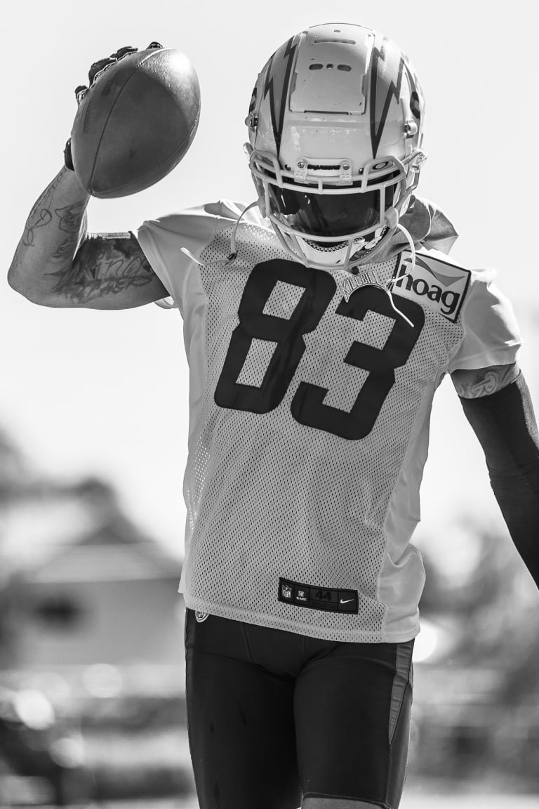 Los Angeles Chargers wide receiver Tyron Johnson (83) is defended