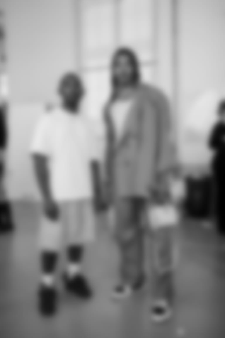 Claypool poses with 1989 designer Chaz Jordan.