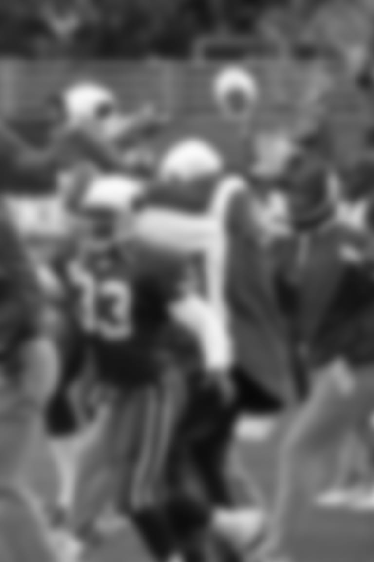 Arizona Cardinals players react to their game-winning touchdown with no time on the clock againt the Minnesota Vikings, Sunday, Dec. 28, 2003, at Sun Devil Stadium in Tempe, Ariz. The Cardinals won,18-17, to eliminate the Vikings from the playoffs. (AP Photo/Matt York)