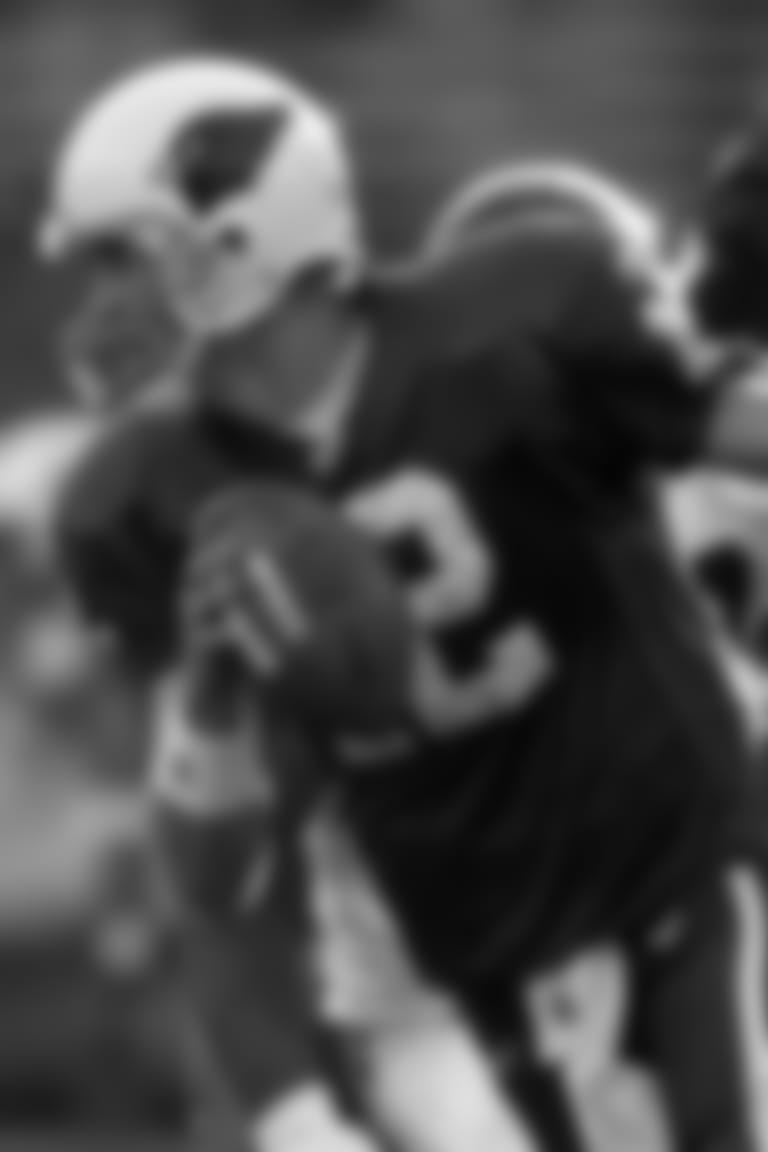 Arizona Cardinals quarterback Josh McCown (12) scrambles against the Minnesota Vikings during the third quarter Sunday, Dec. 28, 2003, at Sun Devil Stadium in Tempe, Ariz. The Cardinals won, 18-17, with no time on the clock to knock the Vikings out of the playoffs. (AP Photo/Matt York)