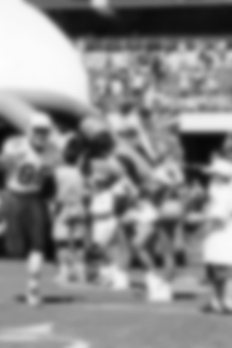 WR Rob Moore-Rod Tidwell comes out of the tunnel during a home game in the 1990s