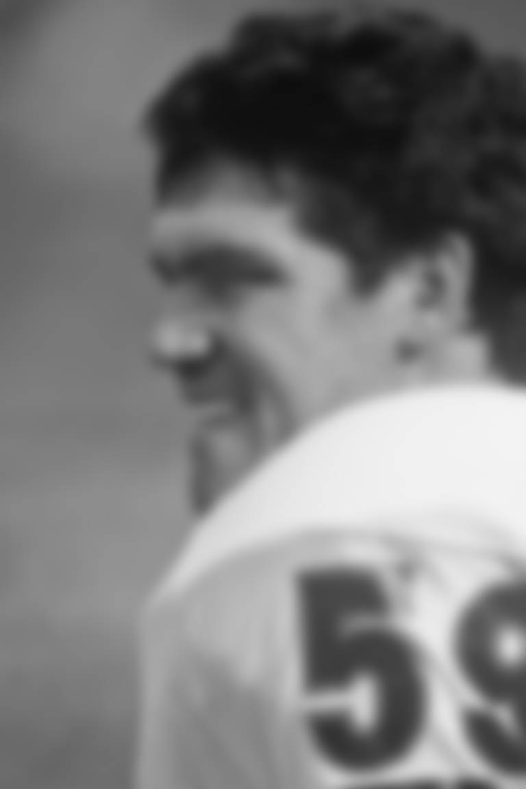 Chicago Bears linebacker Ron Rivera (59) watches play against the Oakland Raiders Dec. 27, 1987 in Oakland. (Al Messerschmidt via AP)