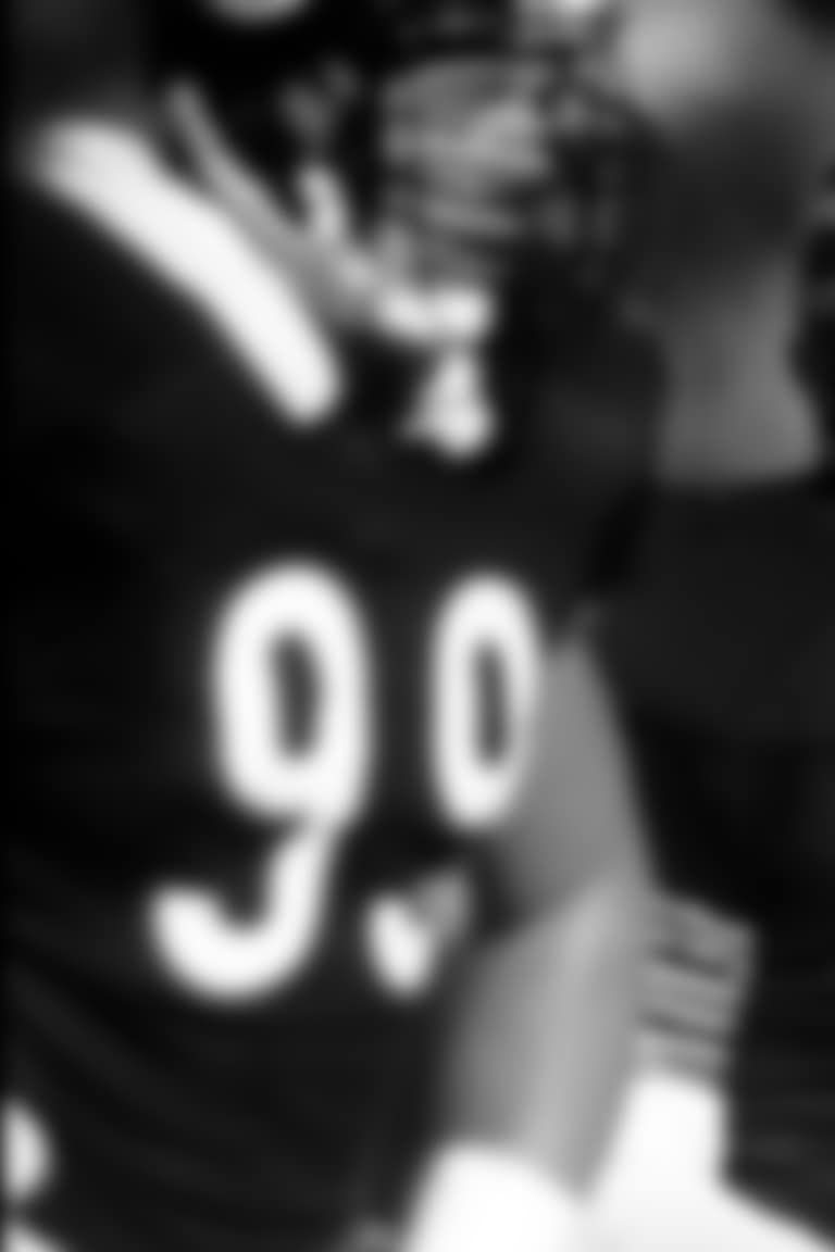 Chicago Bears defensive tackle Dan Hampton (99) and linebacker Ron Rivera (59) during the Bears 21 - 17 loss to the Washington Redskins in the 1987 NFC Divisional Playoff Game on Jan. 10, 1988 at Soldier Field in Chicago.  (Al Messerschmidt via AP)