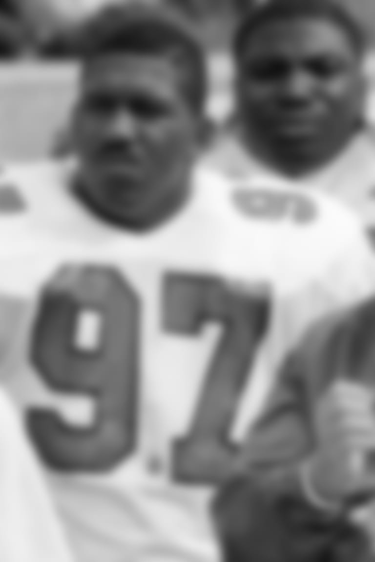 Philadelphia Eagles head coach Buddy Ryan signals in a play during a game in 1986, his first season with the Eagles. To Ryan's right is Jeff Fisher, a defensive backs coach who went on to become a successful head coach with the Houston Oilers/Tennessee Titans. (AP Photo/Mark Elias)