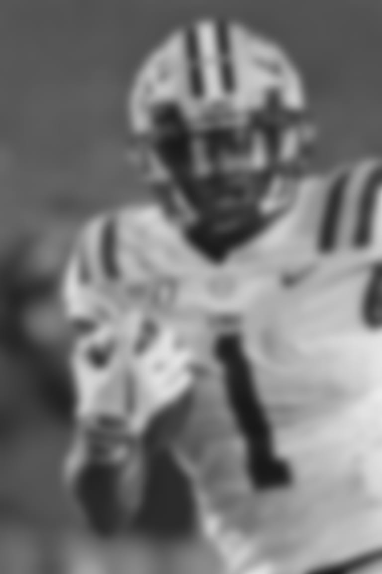 LSU wide receiver Ja'Marr Chase (1) carries the ball during the second half of an NCAA college football game against Mississippi in Oxford, Miss., Saturday, Nov. 16, 2019. No. 1 LSU won 58-37. (AP Photo/Thomas Graning)