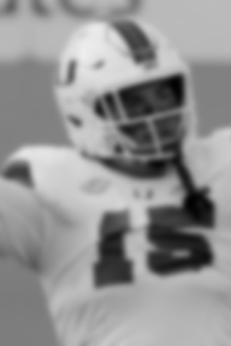 Jaelan Phillips of Miami celebrates a defensive stop during the second half of an NCAA college football game against Virginia Tech Saturday, Nov. 14, 2020, in Blacksburg, Va. (Matt Gentry/The Roanoke Times via AP, Pool)