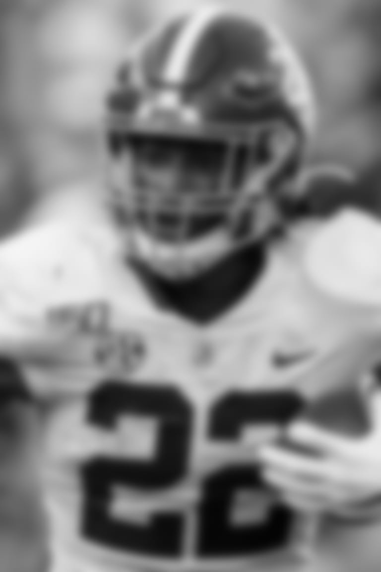 Alabama running back Najee Harris (22) carries the ball during an NCAA college football game against Auburn Saturday, Nov. 30, 2019, in Auburn, Ala. (AP Photo/Butch Dill)