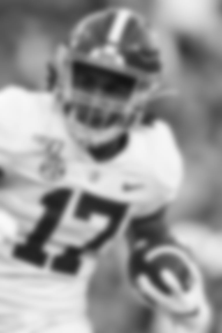 Alabama wide receiver Jaylen Waddle (17) carries the ball in for a touchdown after a reception during the first half of an NCAA college football game against Auburn Saturday, Nov. 30, 2019, in Auburn, Ala. (AP Photo/Butch Dill)