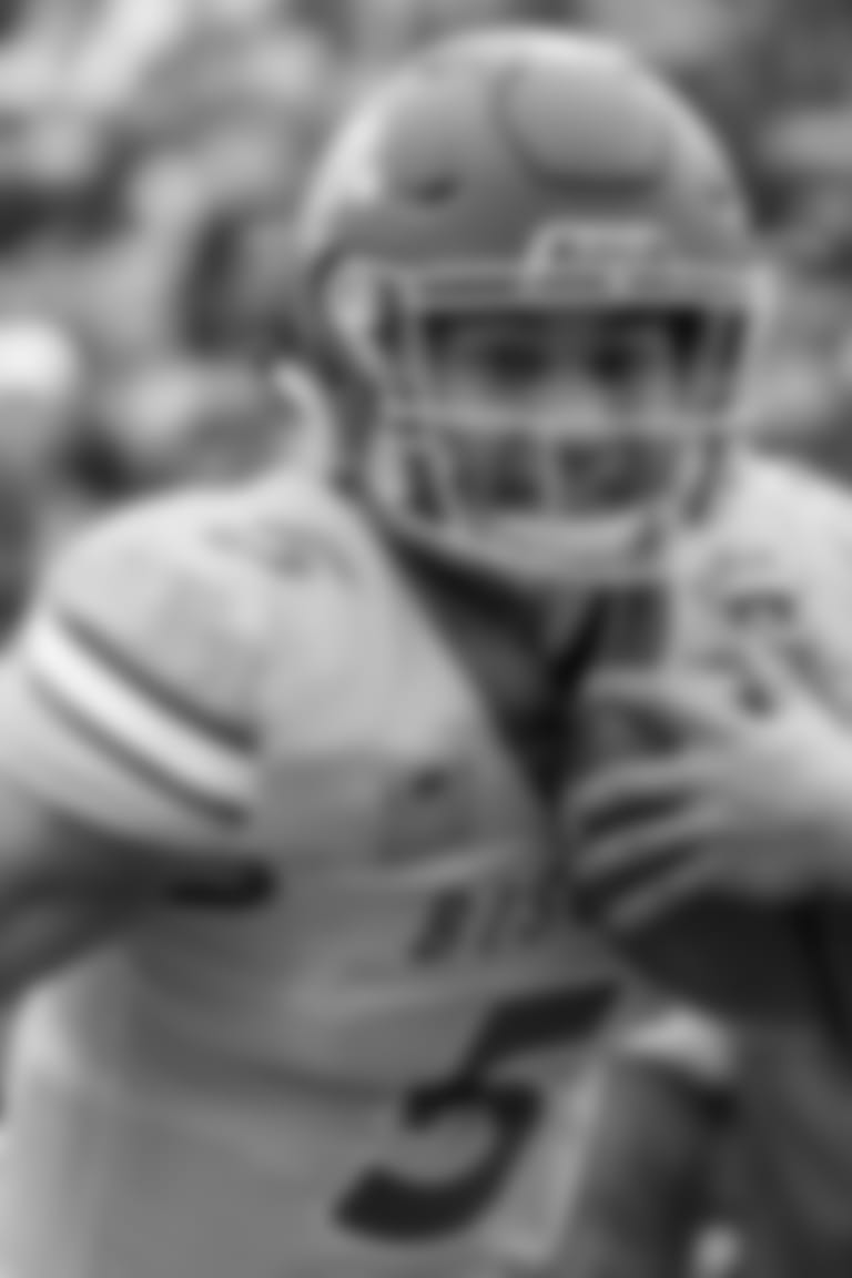 North Dakota State quarterback Trey Lance (5) runs the ball as James Madison safety D'Angelo Amos (24) pursues during the first half of the FCS championship NCAA college football game, Saturday, Jan. 11, 2020, in Frisco, Texas. (AP Photo/Sam Hodde)