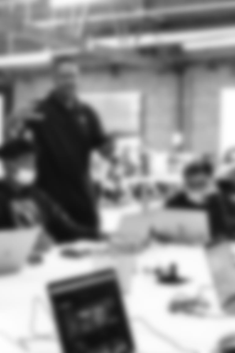 Students participate in an app design class at The Beehive.