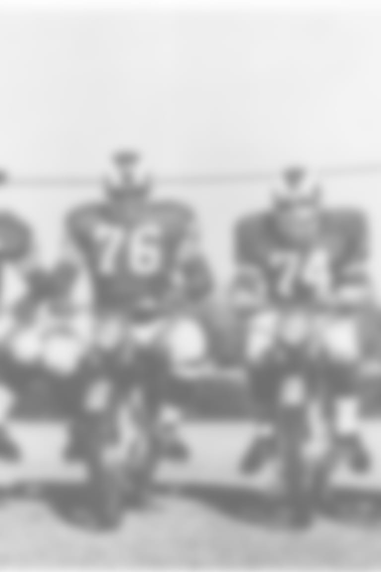 "Archival image of the Fearsome Foursome. Lamar Lundy #85, Rosey Grier #76, Merlin Olsen #74 and Deacon Jones #75 of the Los Angeles Rams."