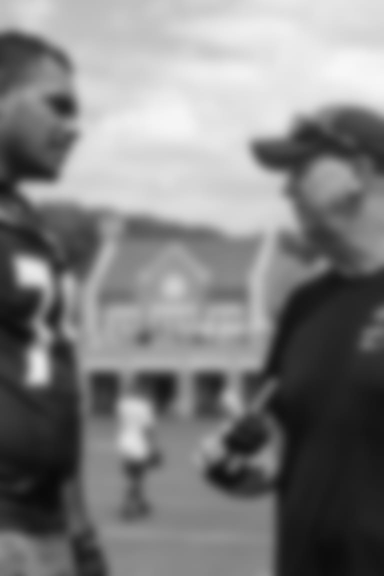 From left: OC Todd Monken, T Morgan Moses, C Tyler Linderbaum