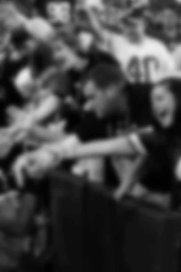 Washington Football Team's Ryan Kerrigan is congratulated by the fans as he leaves the field after an NFL football game against the New York Giants in Landover, Md., Sunday, Sept. 11, 2011. (AP Photo/Evan Vucci)