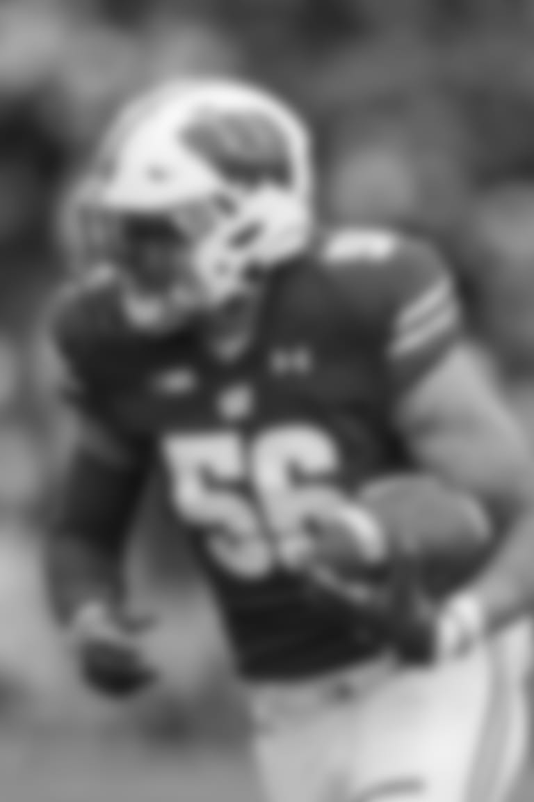 Wisconsin linebacker Zack Baun (56) returns an interception for a touchdown against Michigan State wide receiver C.J. Hayes (4) during the second half of an NCAA college football game Saturday, Oct. 12, 2019, in Madison, Wis. Wisconsin won 38-0. (AP Photo/Andy Manis)