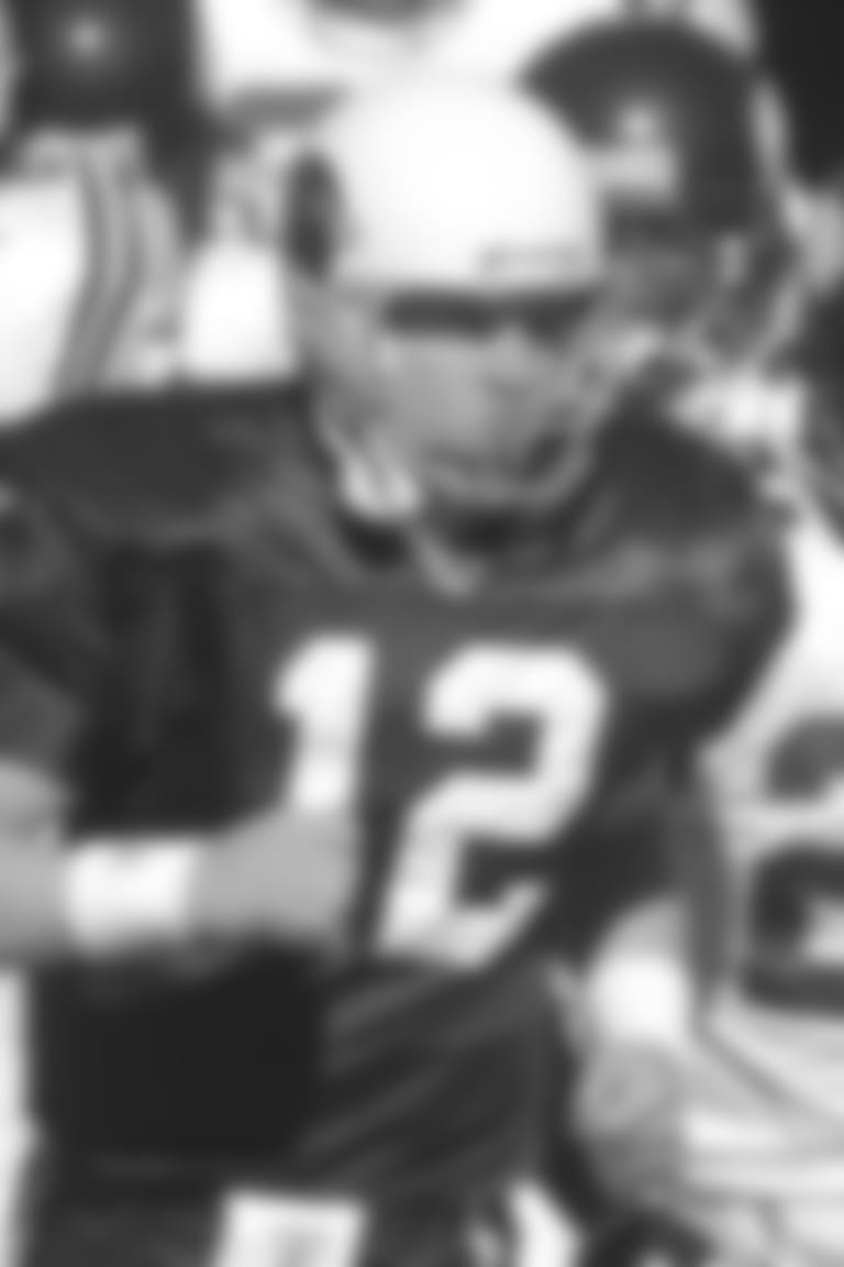 QB Josh McCown runs out of the tunnel next to Vikings safety and former Cardinal Corey Chavous before a game in 2003