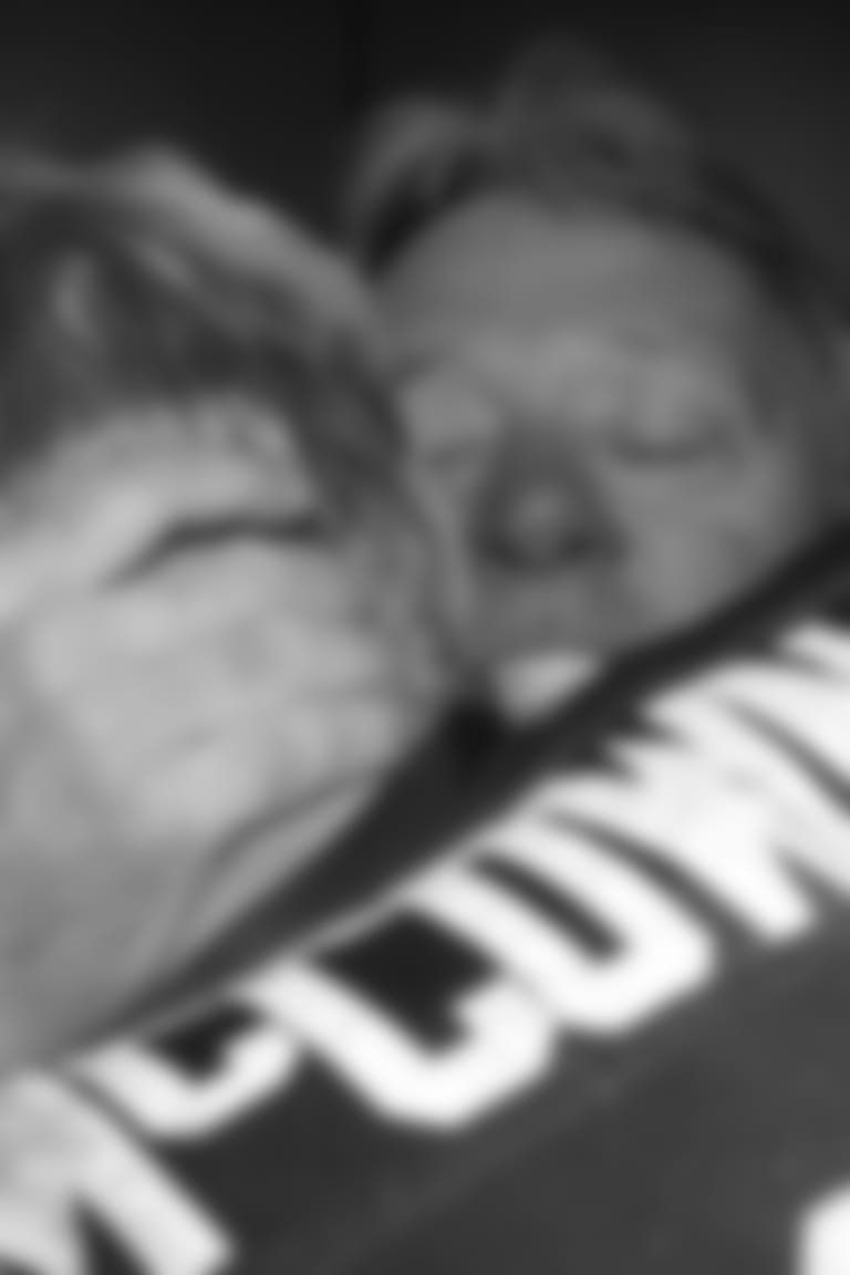 Coach Dave McGinnis hugs QB Josh McCown after the Cards beat the Vikings in 2003