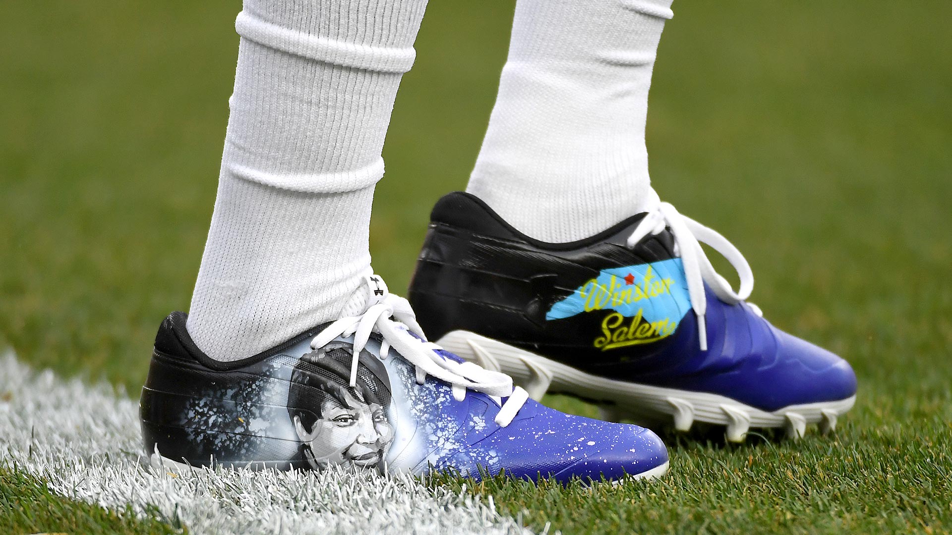 Baltimore Ravens defensive back Anthony Levine (41) wears cleats for the Anthony Levine 4Every1 Foundation as he warms up before an NFL football game against the Pittsburgh Steelers, Sunday, Dec. 5, 2021, in Pittsburgh.