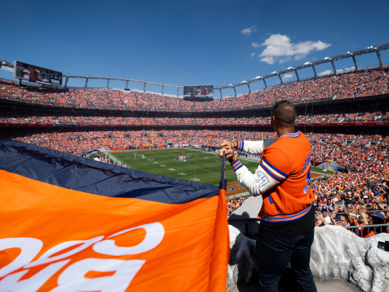 A Broncos alum planting the flag at Empower Field at Mile High