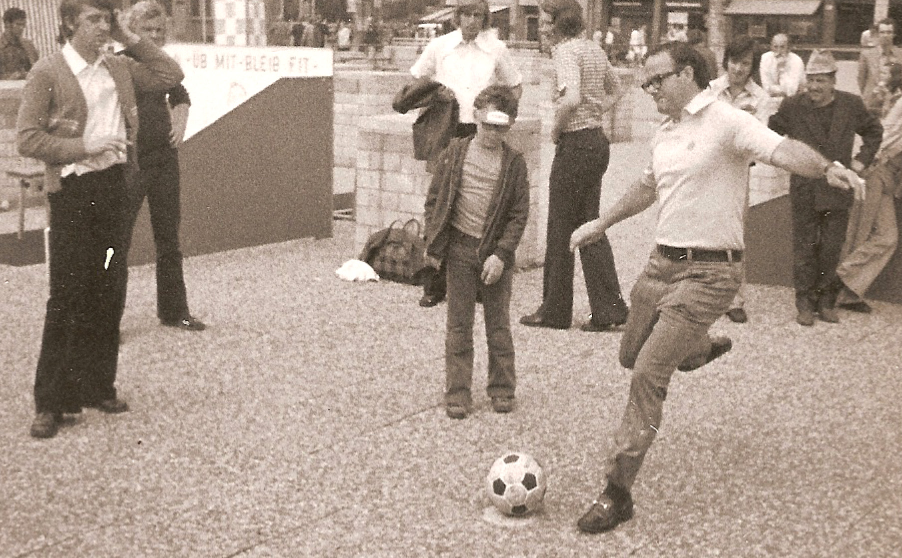 Lamar Hunt kicking a soccer ball