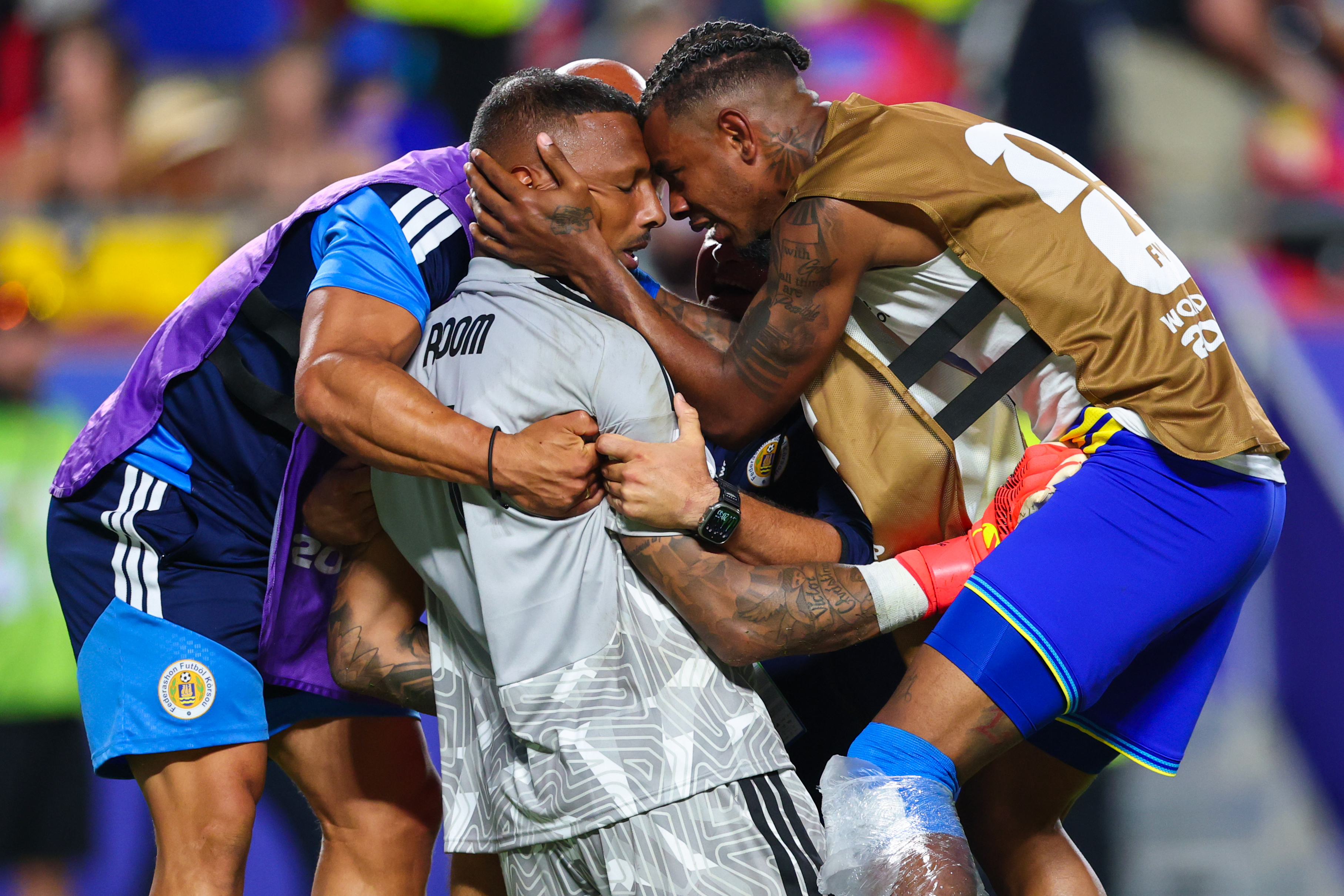 Eloy Room and Curaçao players celebrate