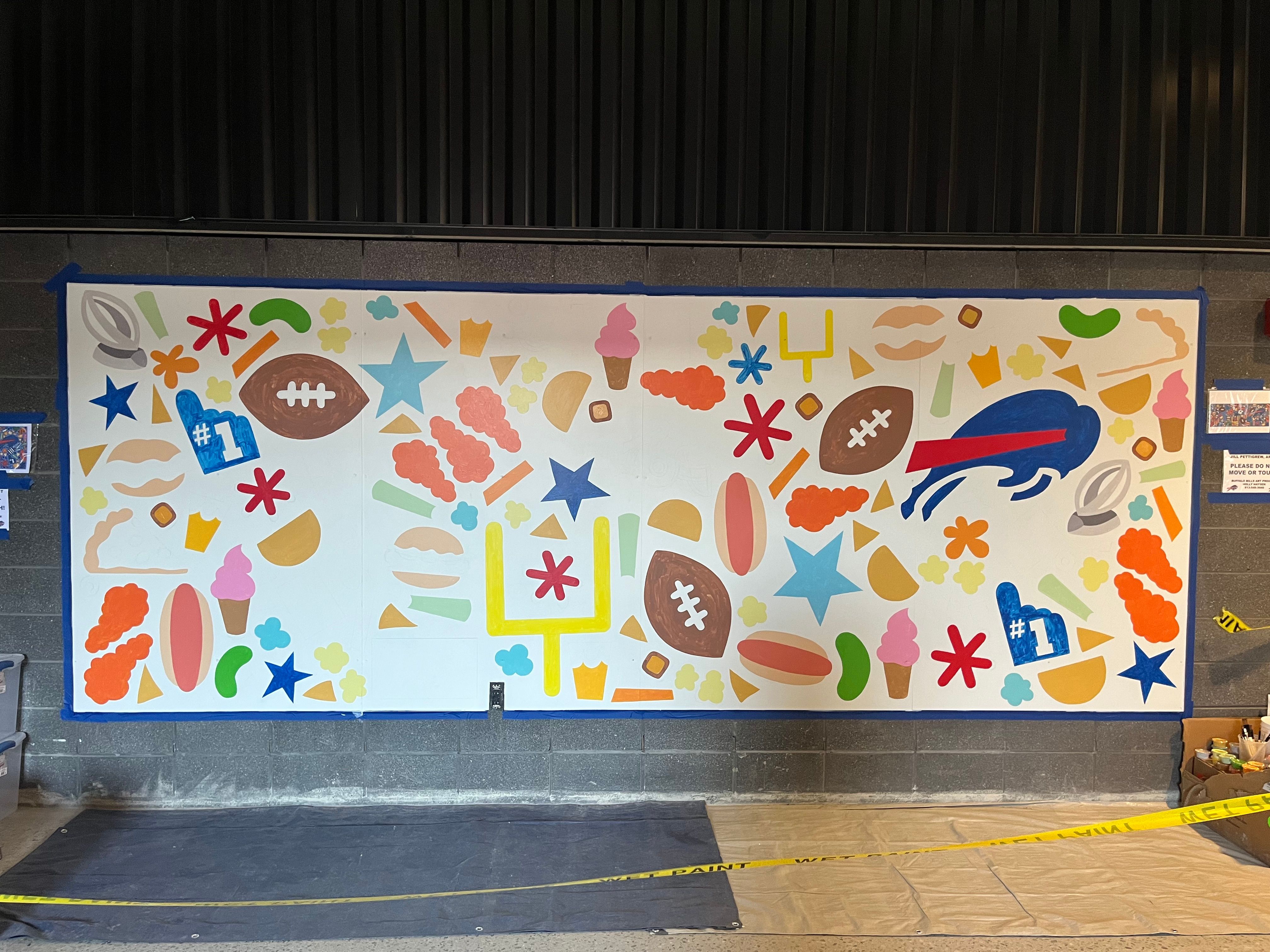 7. Jill Pettigrew Mural in progress .jpeg