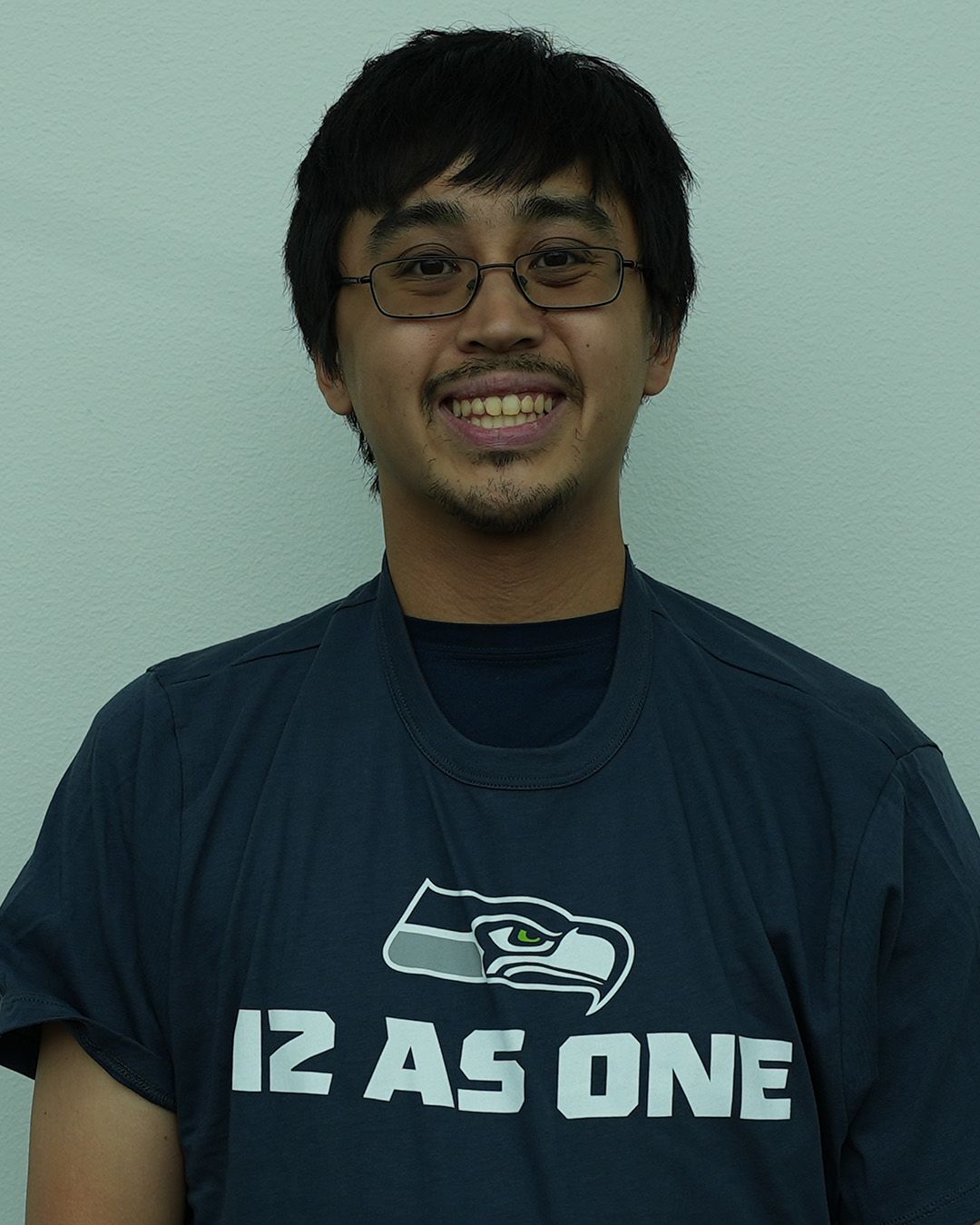 A headshot of Brandon Mar