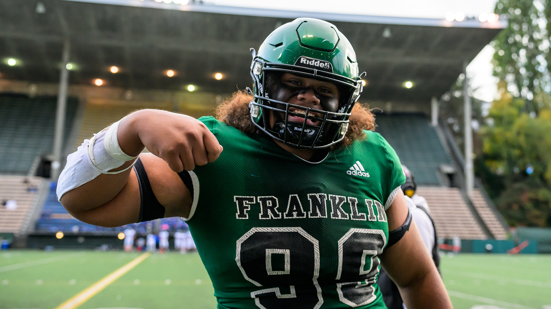 A football player flexing