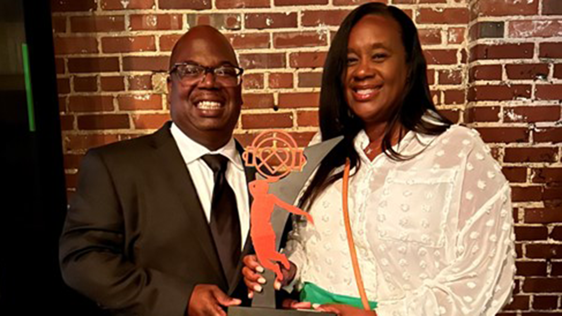 Seahawks DEI Vice President Karen Wilkins-Mickey accepting the Kulture City Venue award