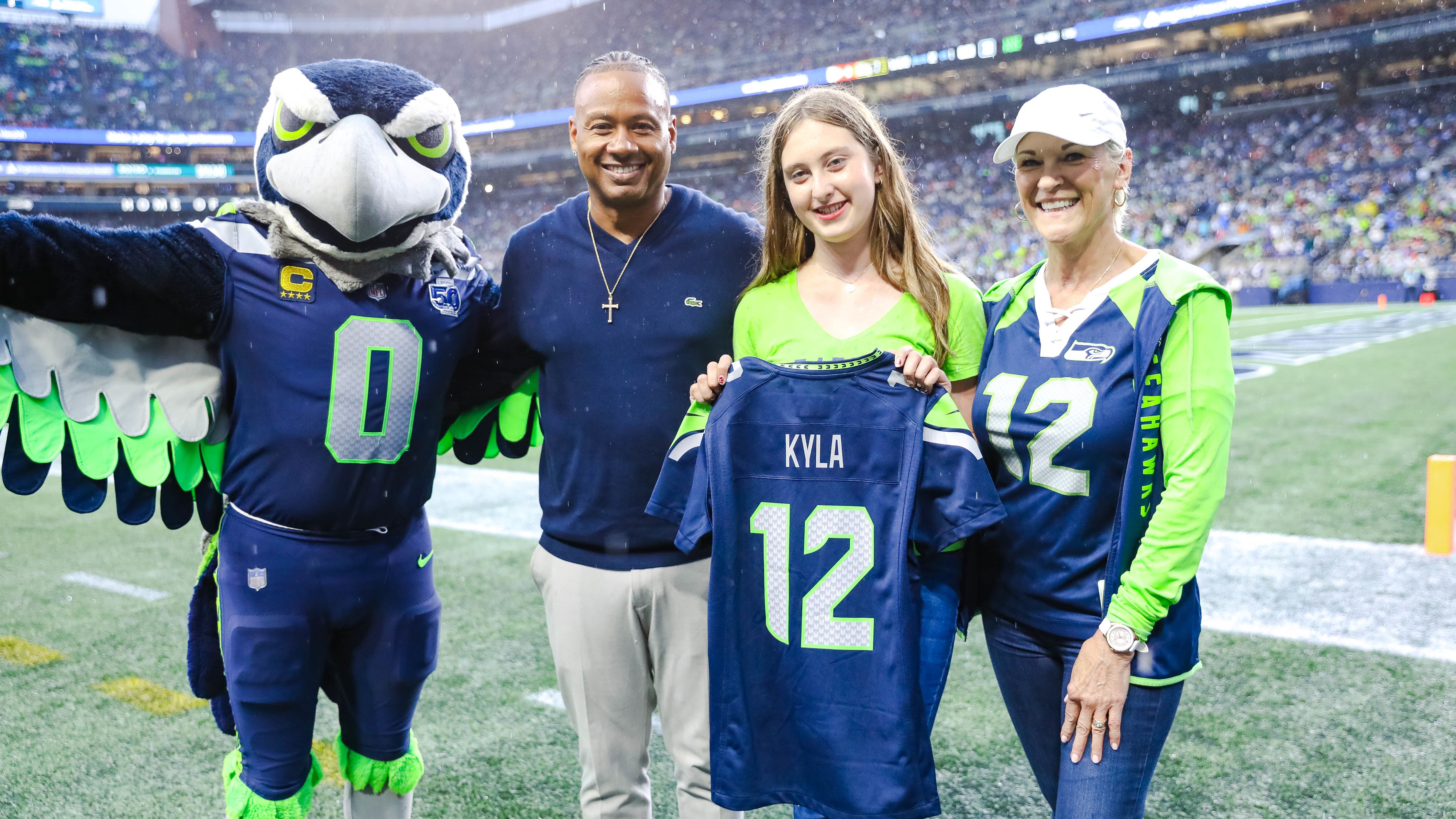 12 Pages Summer Reading Challenge winner at the 8/24 preseason game