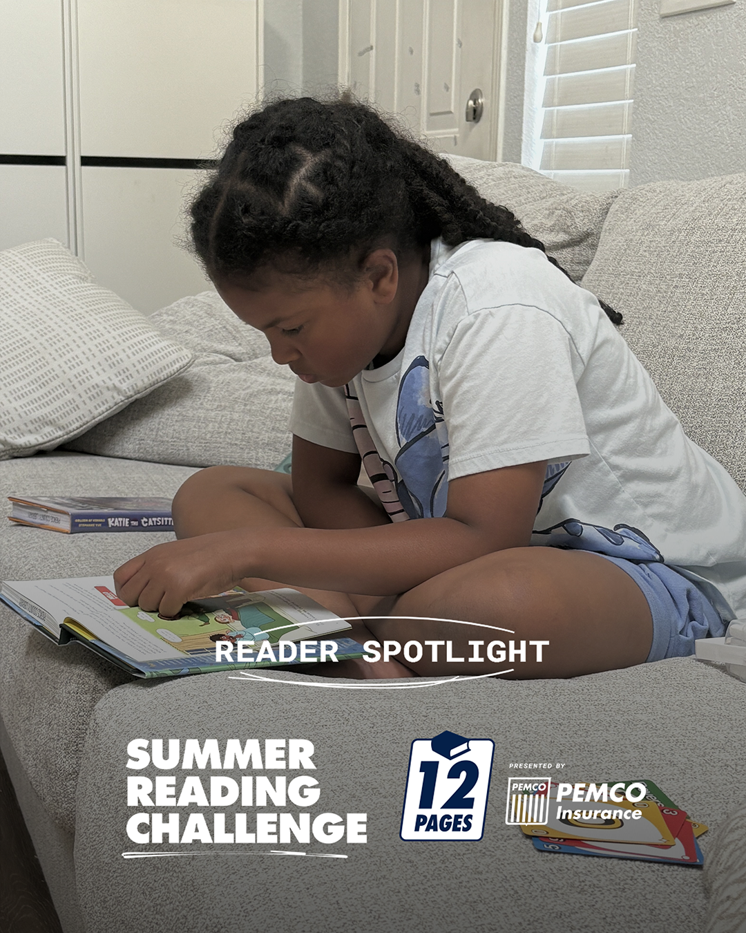 A photo of Zoey reading - Reader Spotlight - Summer Reading Challenge