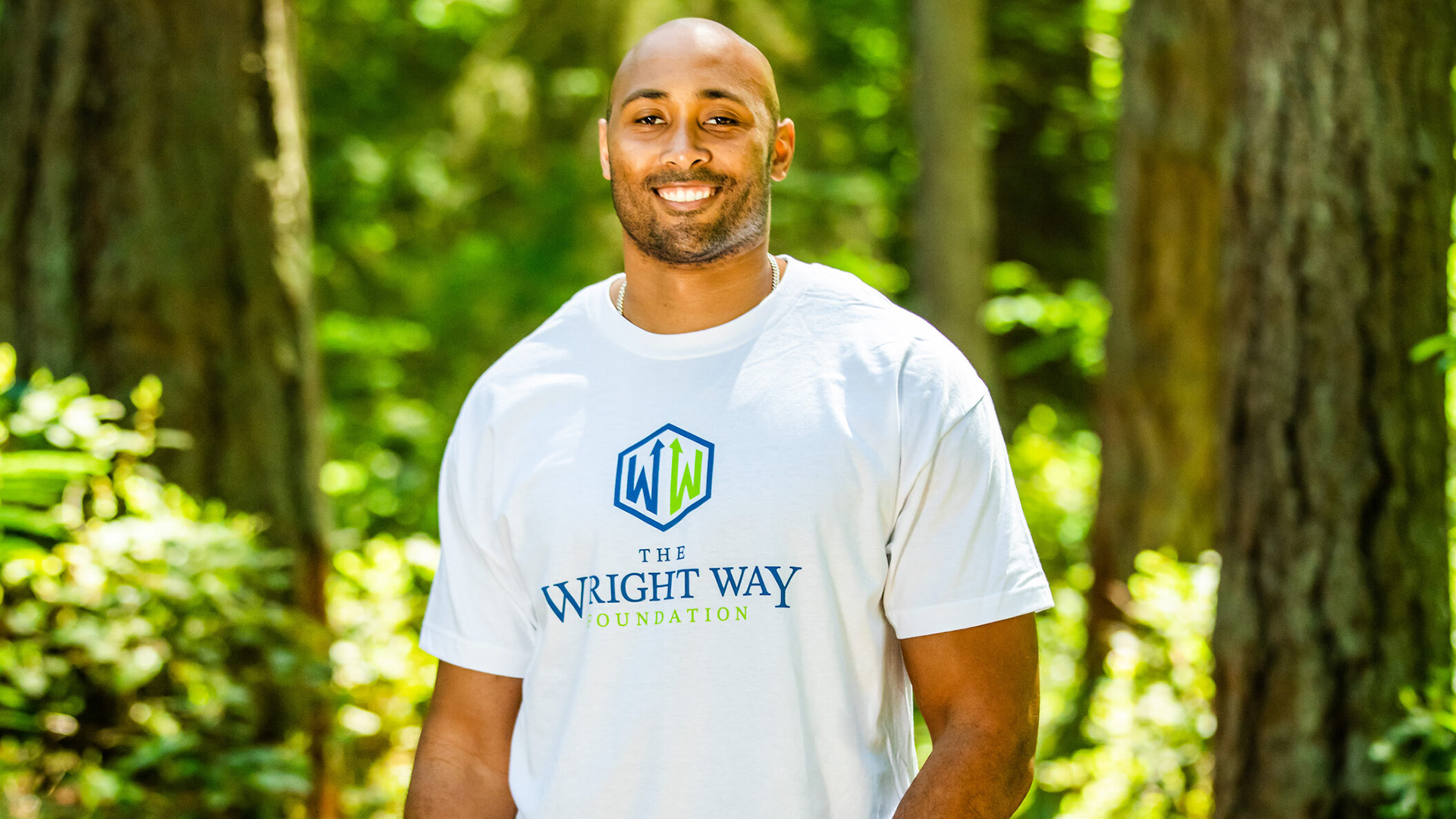 KJ Wright in a Wright Way Foundation Shirt
